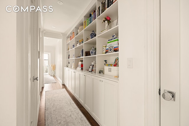 315 E 80th St Unit 2J, New York City, NY 10075 - corridor with dark wood-style floors