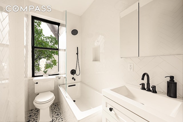 315 E 80th St Unit 2J, New York City, NY 10075 - full bath with tile walls, vanity, toilet, shower / bathtub combination, and tile patterned flooring