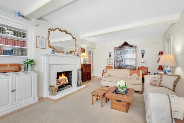434 E 52nd St Unit 6Ab, New York City, NY 10022 - living area with beam ceiling and a brick fireplace