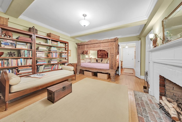 434 E 52nd St Unit 6Ab, New York City, NY 10022 - bedroom featuring hardwood / wood-style floors, ornamental molding, and a fireplace