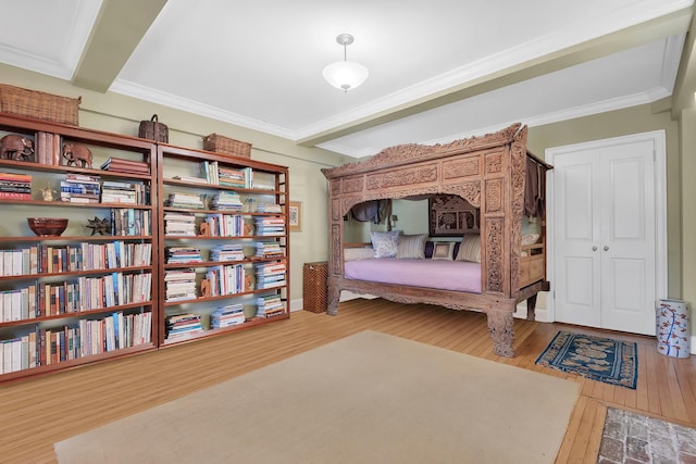 434 E 52nd St Unit 6Ab, New York City, NY 10022 - bedroom with hardwood / wood-style flooring and ornamental molding