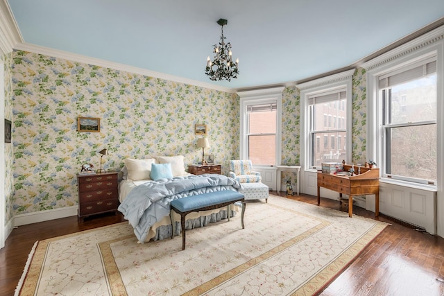 330 Convent Ave, New York City, NY 10031 - bedroom with crown molding, wood finished floors, wallpapered walls, a chandelier, and baseboards