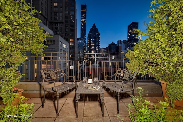 view of patio with a view of skyline