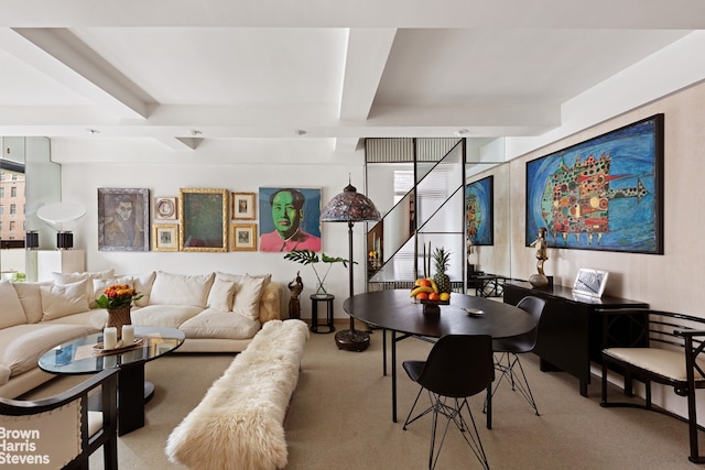 living area featuring stairway and carpet floors