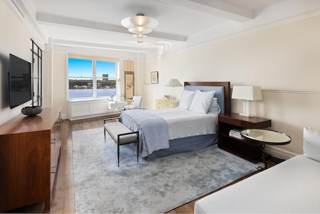 90 Riverside Dr Unit 14A, New York City, NY 10024 - bedroom featuring wood finished floors, beamed ceiling, and a water view