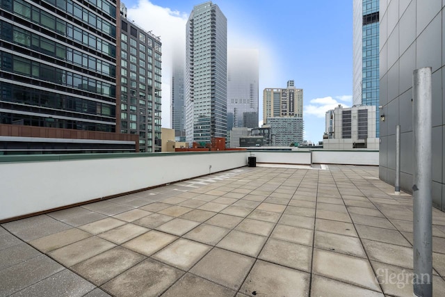 view of patio featuring a skyline view