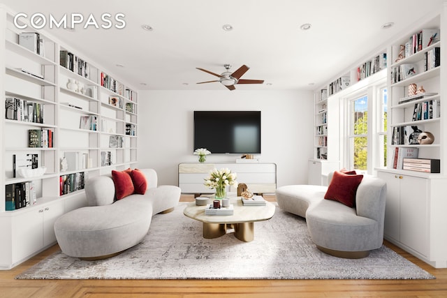 759 42nd St Unit 15, New York City, NY 11232 - living room with wood finished floors, ceiling fan, built in shelves, and recessed lighting