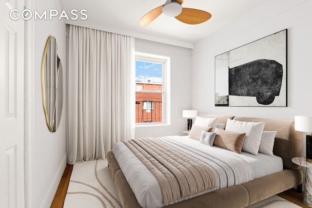 759 42nd St Unit 15, New York City, NY 11232 - bedroom with wood finished floors and a ceiling fan