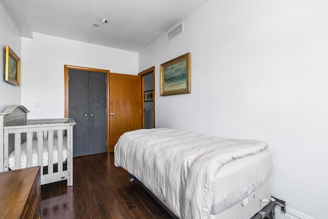 133 W 14th St Unit 6Ph, New York City, NY 10011 - bedroom with wood finished floors and a closet