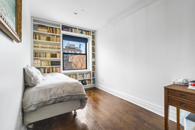 133 W 14th St Unit 6Ph, New York City, NY 10011 - bedroom featuring wood finished floors and baseboards