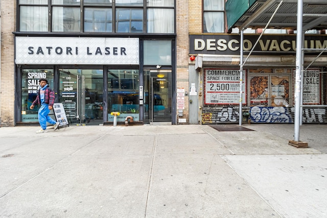 133 W 14th St Unit 6Ph, New York City, NY 10011 - view of exterior entry with brick siding