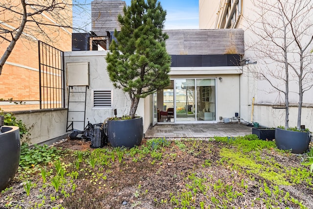 133 W 14th St Unit 6Ph, New York City, NY 10011 - rear view of property featuring a patio and stucco siding