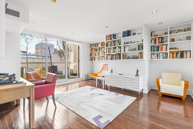 133 W 14th St Unit 6Ph, New York City, NY 10011 - living area with wood finished floors, recessed lighting, and baseboards