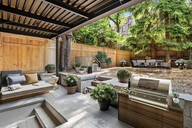 119 Henry St Unit 1, New York City, NY 11201 - fenced backyard featuring a patio, area for grilling, and outdoor dining space