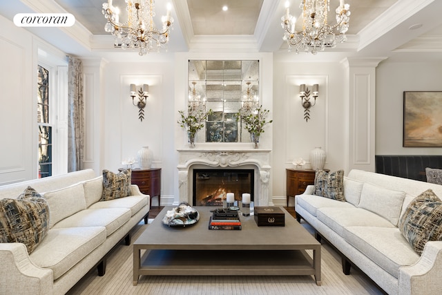 169 E 71st St, New York City, NY 10021 - living area featuring a tray ceiling, a chandelier, a high end fireplace, and crown molding