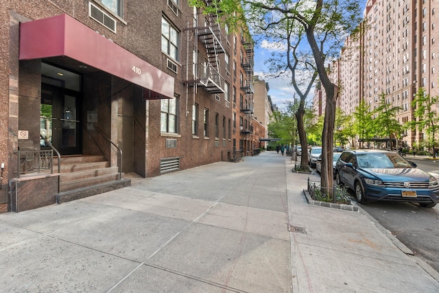 410 W 23rd St Unit 4E, New York City, NY 10011 - view of concrete road featuring sidewalks