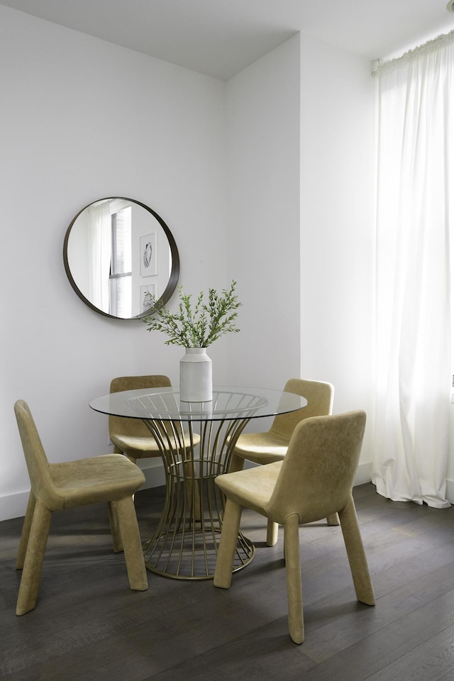 dining area featuring wood finished floors