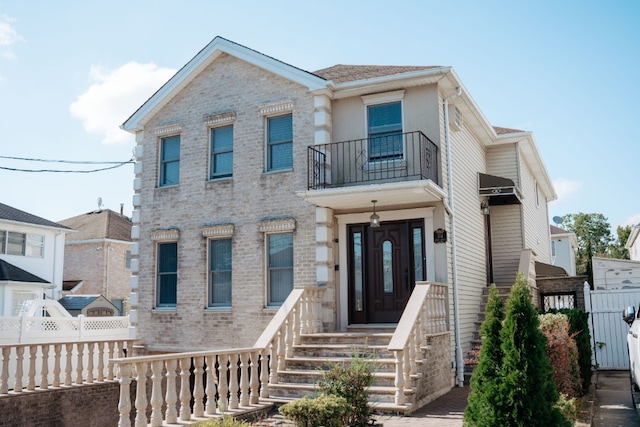 view of front of home featuring fence