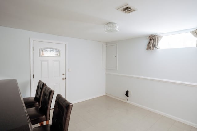 unfurnished office with baseboards