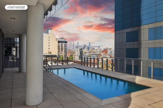 565 Broome St Unit S16B, New York City, NY 10013 - community pool featuring a skyline view