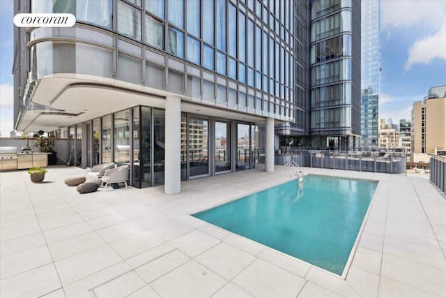 565 Broome St Unit S16B, New York City, NY 10013 - community pool featuring a patio area and a city view