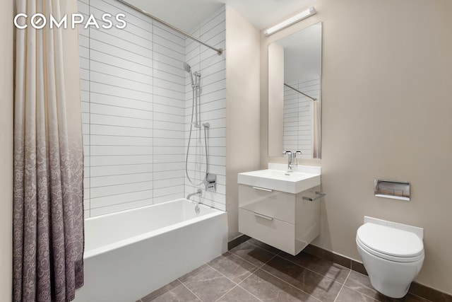 101 Leonard St Unit 2E, New York City, NY 10013 - bathroom featuring shower / bath combo, vanity, baseboards, and toilet