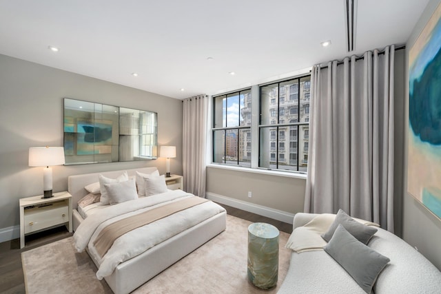2112 Broadway Unit 7/8Bt, New York City, NY 10023 - bedroom with wood finished floors, baseboards, and recessed lighting