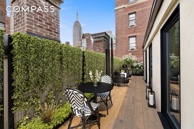 view of patio with a balcony