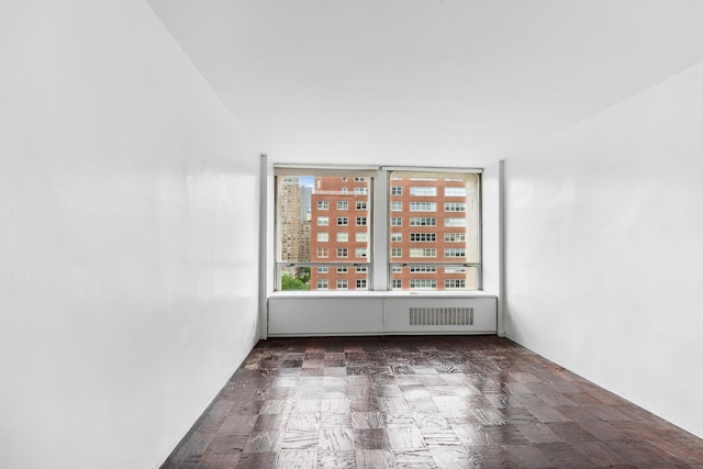 300 E 33rd St Unit 9M, New York City, NY 10016 - unfurnished room featuring radiator