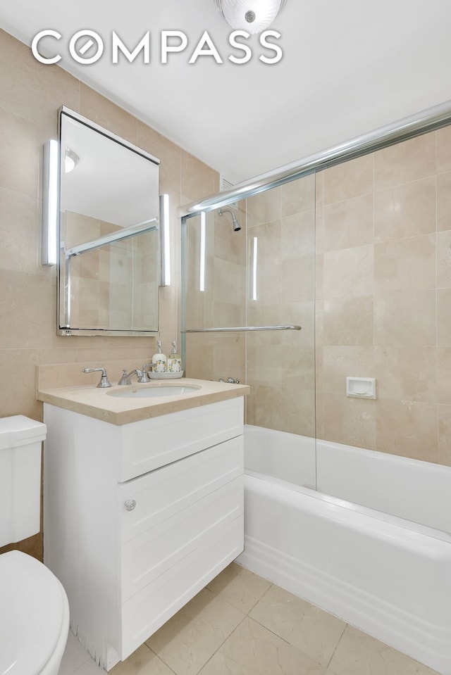 120 E 81st St Unit 8A, New York City, NY 10028 - full bathroom with toilet, vanity, and tub / shower combination