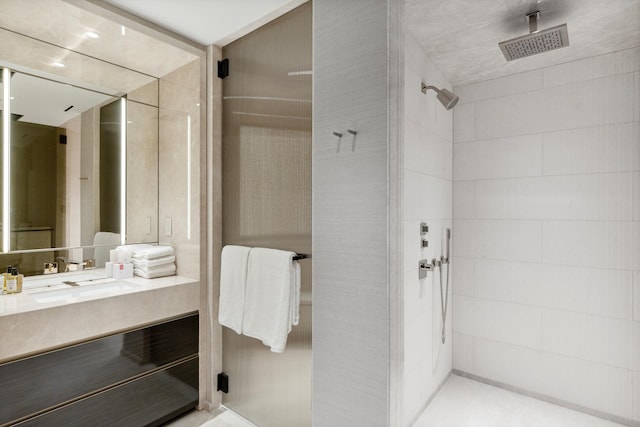 685 5th Ave Unit 15B, New York City, NY 10022 - full bath featuring tiled shower and vanity