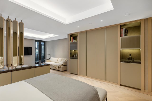 685 5th Ave Unit 15B, New York City, NY 10022 - bedroom with a tray ceiling and recessed lighting