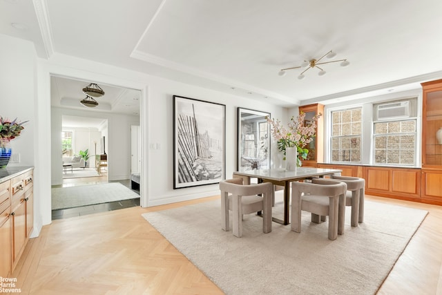 607 W End Ave Unit 4A, New York City, NY 10024 - dining area with a tray ceiling, a chandelier, and baseboards