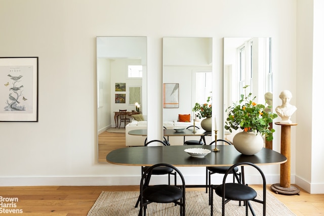 96 Schermerhorn St Unit 11F, New York City, NY 11201 - dining room with baseboards and wood finished floors