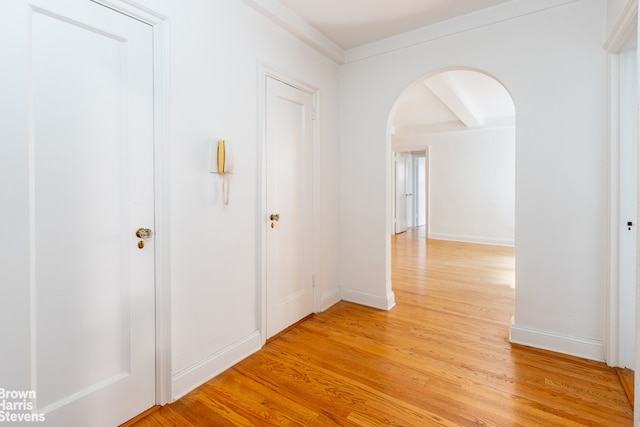 235 W End Ave Unit 3C, New York City, NY 10023 - corridor with arched walkways, light wood finished floors, and baseboards