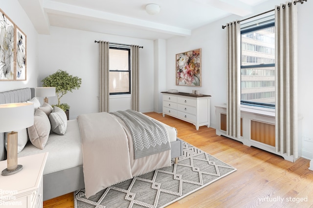 235 W End Ave Unit 3C, New York City, NY 10023 - bedroom with beam ceiling and light wood-type flooring