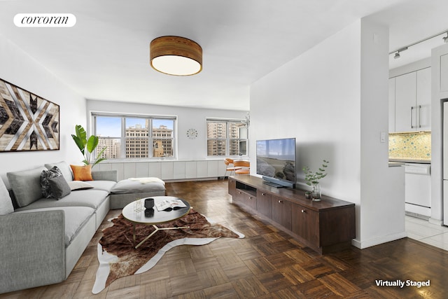 20 E 9th St Unit 18D, New York City, NY 10003 - living area featuring baseboards