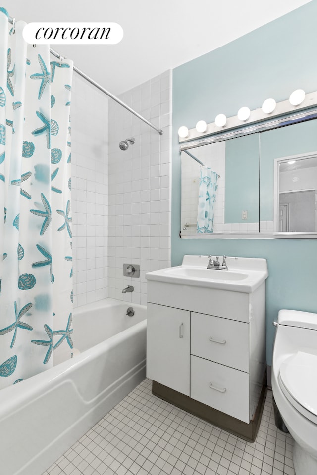20 E 9th St Unit 18D, New York City, NY 10003 - bathroom featuring shower / tub combo, tile patterned flooring, toilet, and vanity
