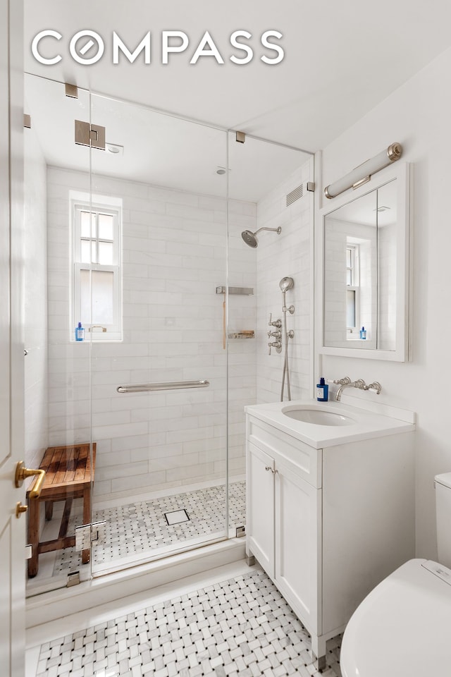 575 Park Ave Unit 1201, New York City, NY 10065 - full bath featuring toilet, vanity, and a shower stall