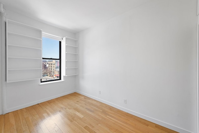 64 Macdougal St Unit 15, New York City, NY 10012 - empty room with light wood-style flooring and baseboards
