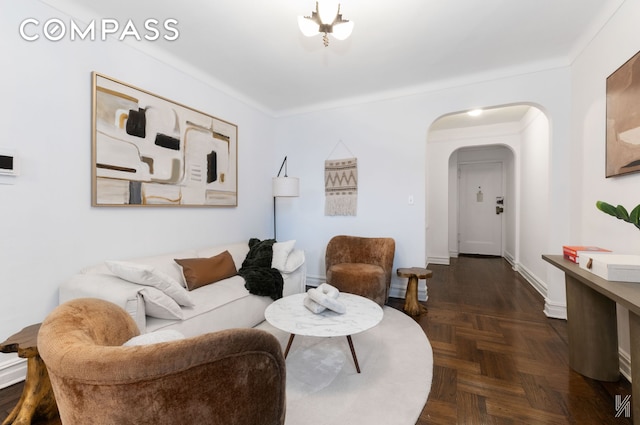35-06 88th St Unit 5E, New York City, NY 11372 - living room featuring arched walkways and baseboards