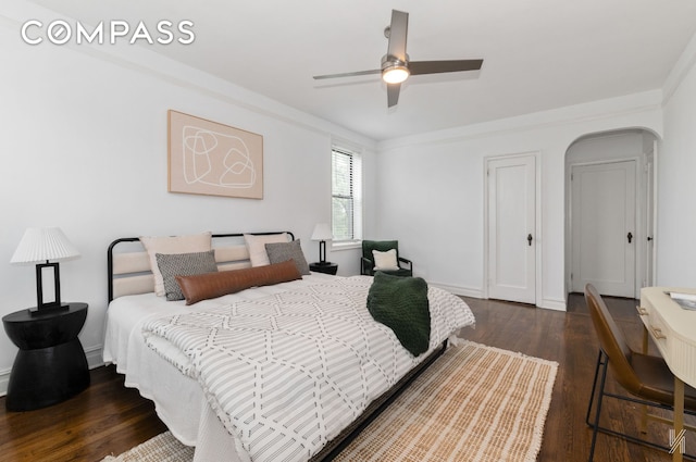 35-06 88th St Unit 5E, New York City, NY 11372 - bedroom featuring wood finished floors, a ceiling fan, arched walkways, and ornamental molding