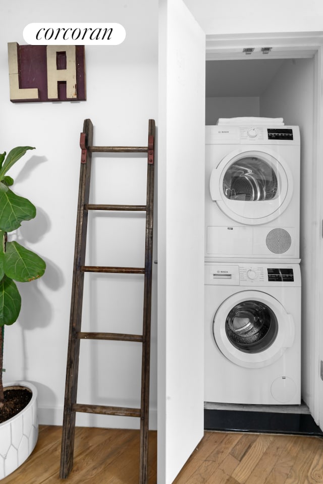 186 Putnam Ave Unit 2B, New York City, NY 11216 - laundry area featuring stacked washer / drying machine and wood finished floors