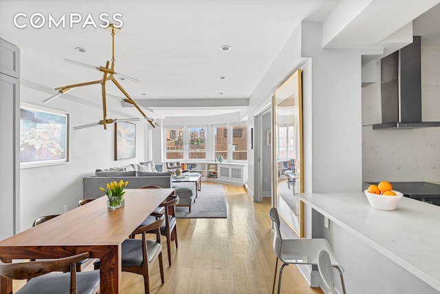 80 E End Ave Unit 17C, New York City, NY 10028 - dining space featuring light wood-style floors