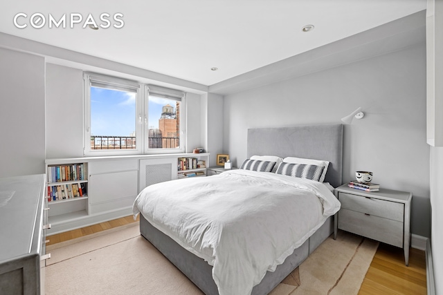 80 E End Ave Unit 17C, New York City, NY 10028 - bedroom with light wood finished floors