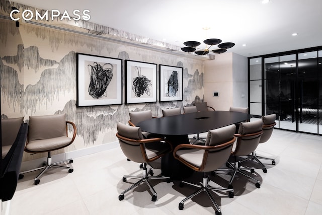 400 E 67th St Unit 7G, New York City, NY 10065 - office area featuring a chandelier, wallpapered walls, tile patterned flooring, and recessed lighting