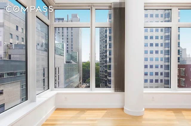 400 E 67th St Unit 7G, New York City, NY 10065 - unfurnished sunroom with a city view