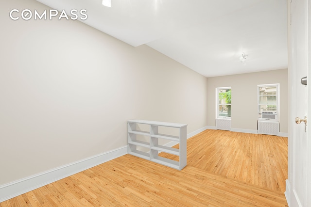 510 E 84th St Unit 1B, New York City, NY 10028 - empty room featuring wood finished floors and baseboards