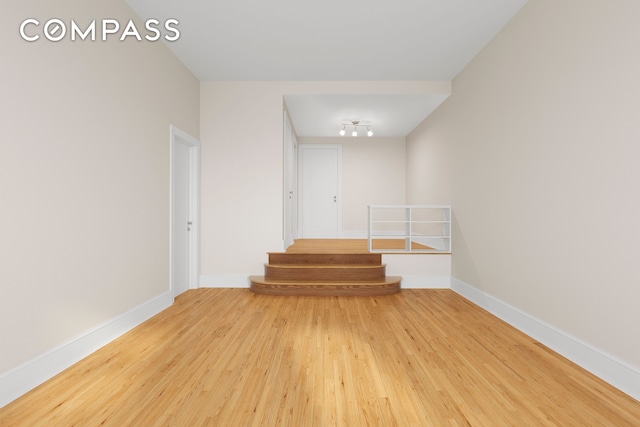 510 E 84th St Unit 1B, New York City, NY 10028 - unfurnished room with wood finished floors and baseboards