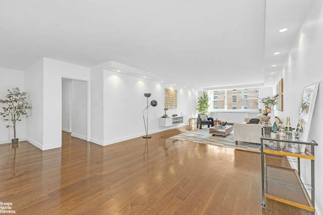 501 E 79th St Unit 5A, New York City, NY 10075 - living area with wood finished floors, recessed lighting, and baseboards